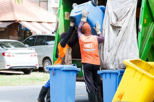 Clearance crew preparing equipment and PPE before a job